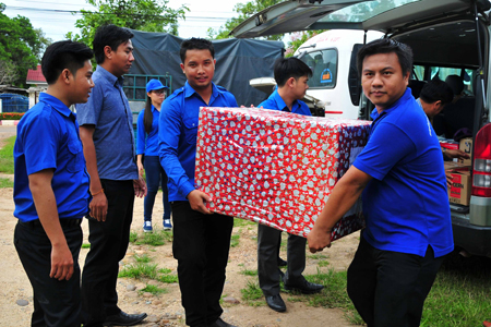 Carrying presents to offer to Attapeu Province.