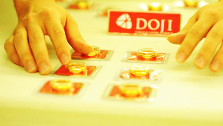 Giá USD tăng, vàng lặng sóng