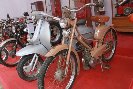 Exhibition displays many vintage vehicles such as Mobilet, Vespa and Honda 67.