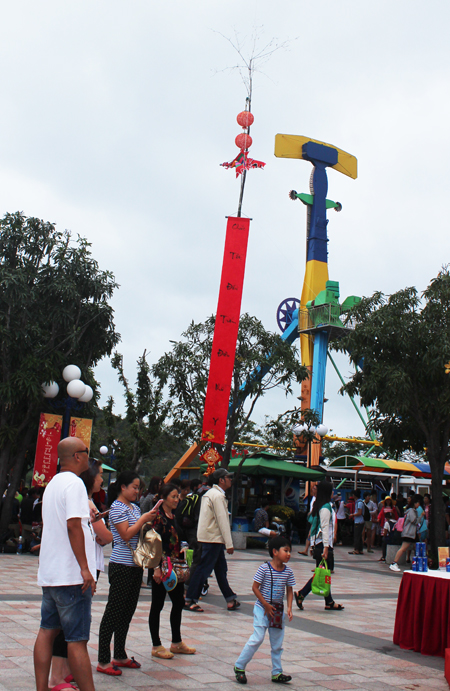 Tet pole at Vinpearl Land Nha Trang reminds people of traditional custom of Vietnamese during Tet.