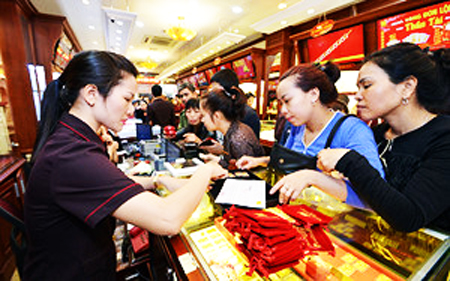 Giá vàng giảm nhanh trong sáng ngày vía Thần tài