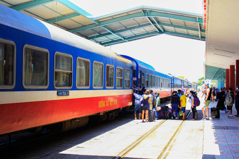 Passengers getting on train at Nha Trang Railway Station