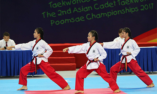 Vietnamese trio wins gold in women’ team standard poomsae. (Photo: Nguyen Phuong)