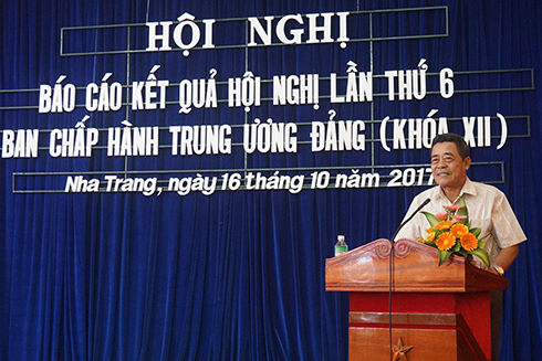 Ông Lê Thanh Quang báo cáo tại hội nghị.