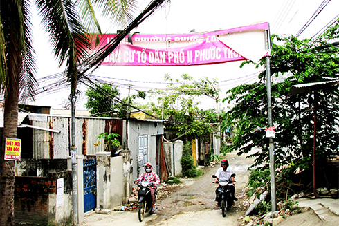 Cần chỉnh trang lại bảng hiệu khu dân cư