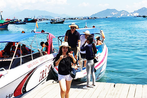 Tourists visiting Binh Ba Island