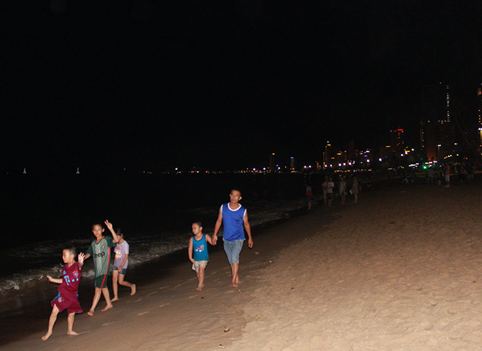 Many people take a walk along the beach…