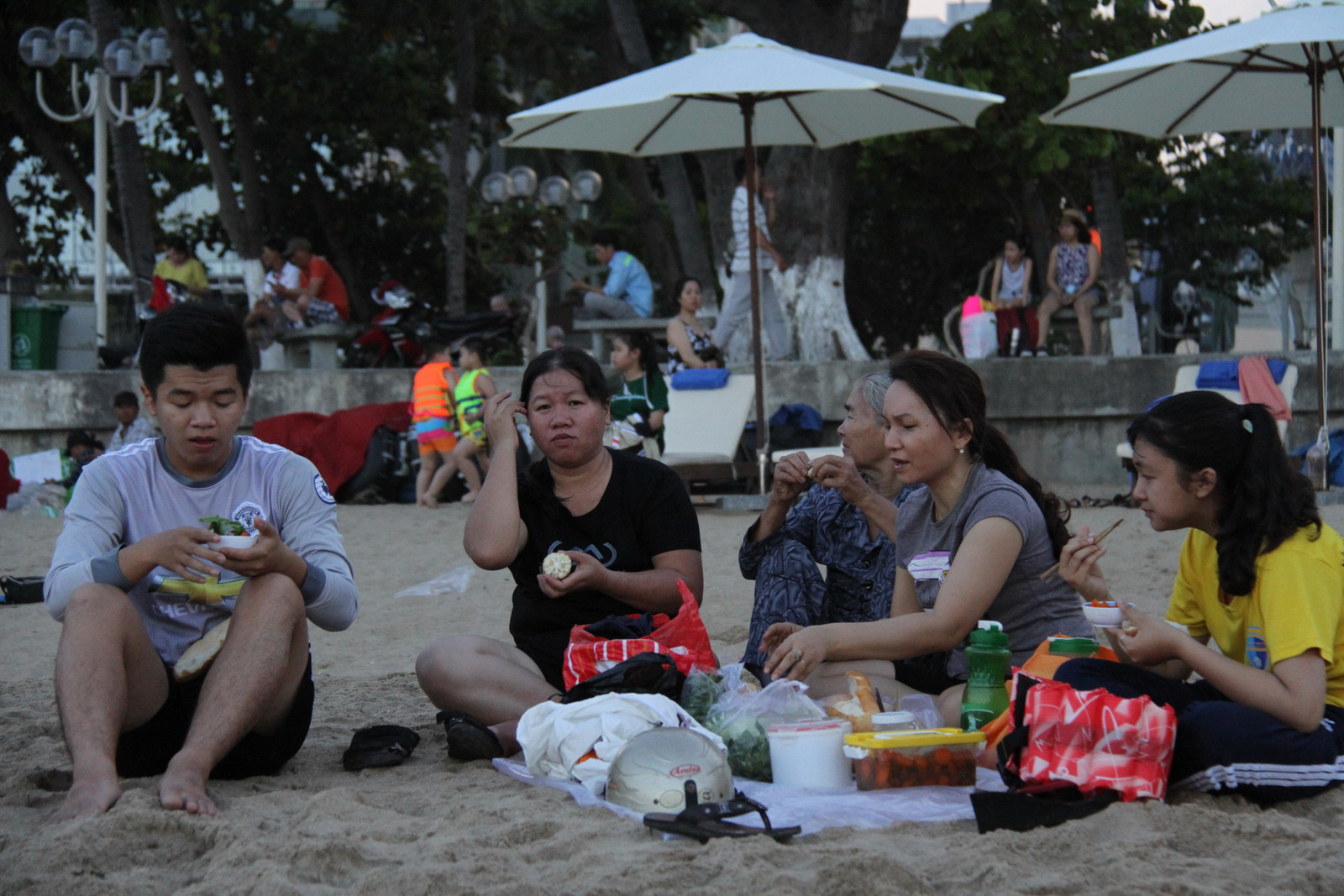 Many people have picnic at the beach