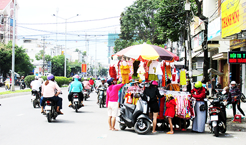 Chiếm dụng lòng đường để bán hàng
