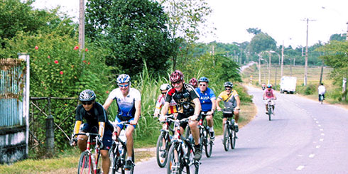 Tourists take bike tour going aroud countryside in Nha Trang