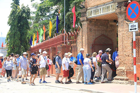 Foreign tourists visiting Ponagar Temple