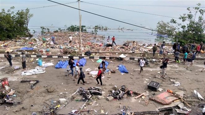 Hiện trường đổ nát sau khi sóng thần ập vào Palu, đảo Sulawesi, Indonesia ngày 29/8/2018. (Ảnh: AFP/TTXVN)