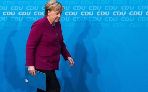 Thủ tướng Angela Merkel sau cuộc họp báo tại trụ sở của CDU (Ảnh: AFP/Getty Image)