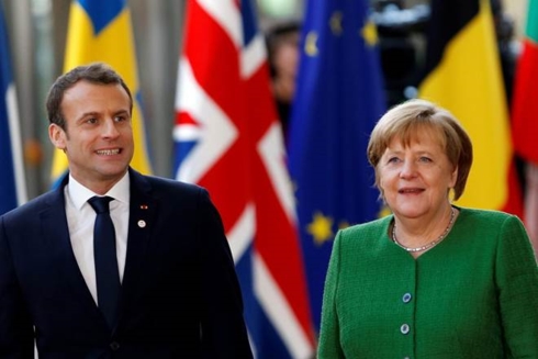 Tổng thống Pháp Emmanuel Macron và Thủ tướng Đức Angela Merkel. Ảnh: Reuters.