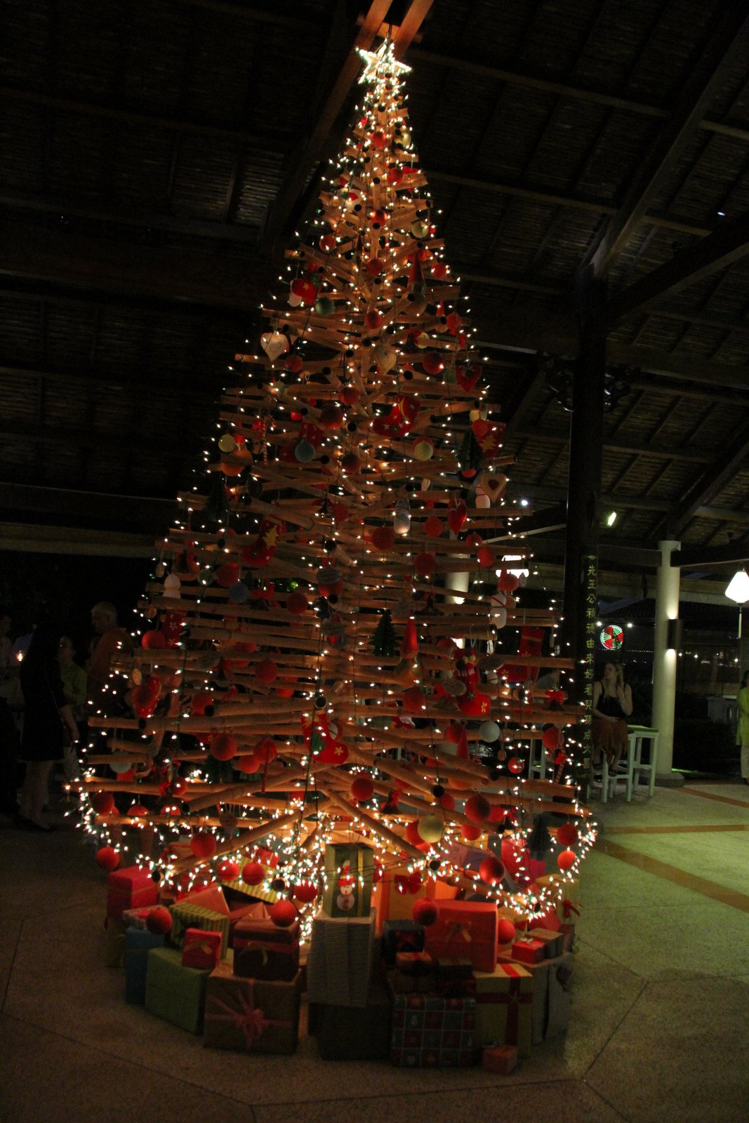 Christmas tree is made of waste items as a message for environmental protection
