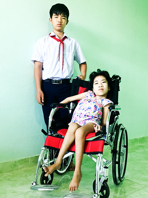 Phan Nhat Truong and his younger sister