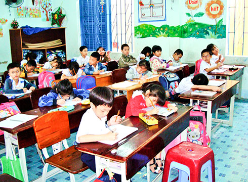 zzHọc sinh một trường tiểu học của TP. Nha Trang.