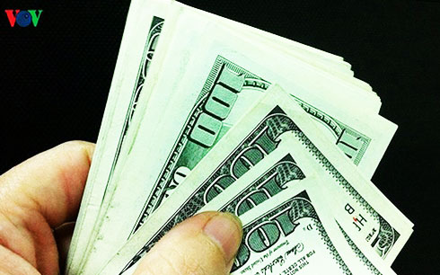 NHNN giảm tỷ giá trung tâm