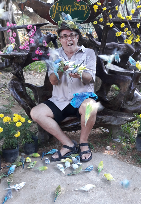 American tourist Michael Belanger has pleasant time with birds