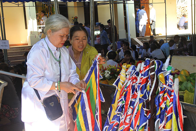Preparing flags for ceremony