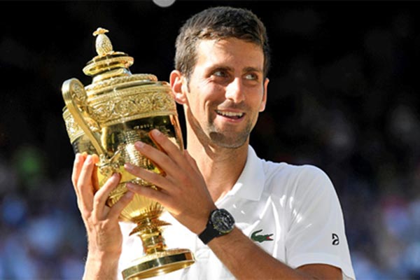 Djokovic nhận 2,86 triệu đôla tiền thưởng cho chức vô địch Wimbledon 2018. Ảnh: Reuters.