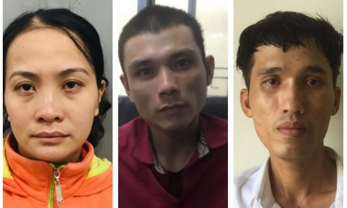 Vợ chồng (từ trái qua) Sinh và đối tượng Mai tại cơ quan điều tra.