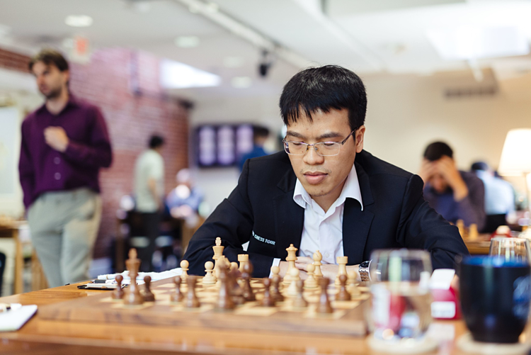 Quang Liêm vô địch ba giải cờ tiêu chuẩn liên tiếp mà anh tham dự.