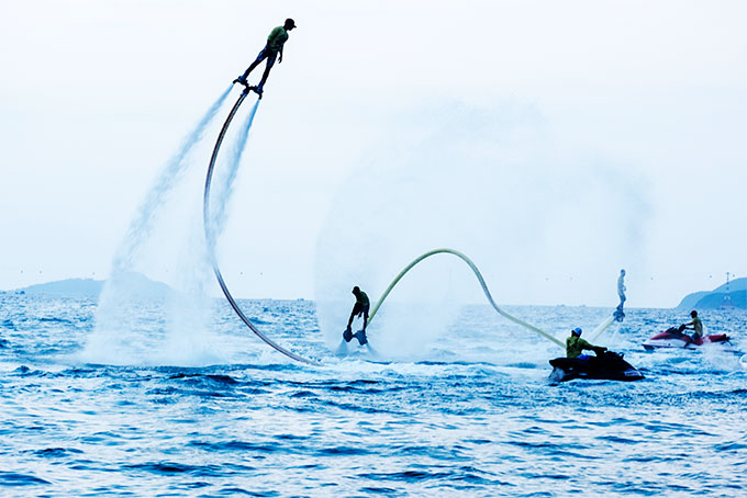 Tourists playing flyboard in Nha Trang