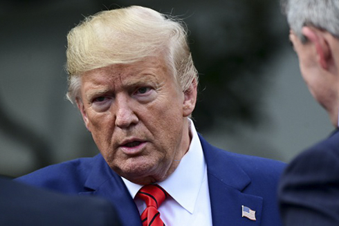 Tổng thống Trump đang đối mặt với cuộc điều tra luận tội. Ảnh: Atlantic.