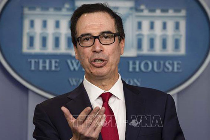 Bộ trưởng Tài chính Mỹ Steven Mnuchin phát biểu tại Nhà Trắng ở Washington, DC, Mỹ. Ảnh: AFP/TTXVN