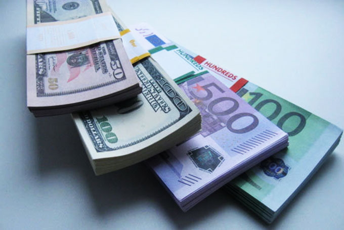 Tỷ giá ngoại tệ ngày 13/12, USD suy yếu sau chính sách của Fed