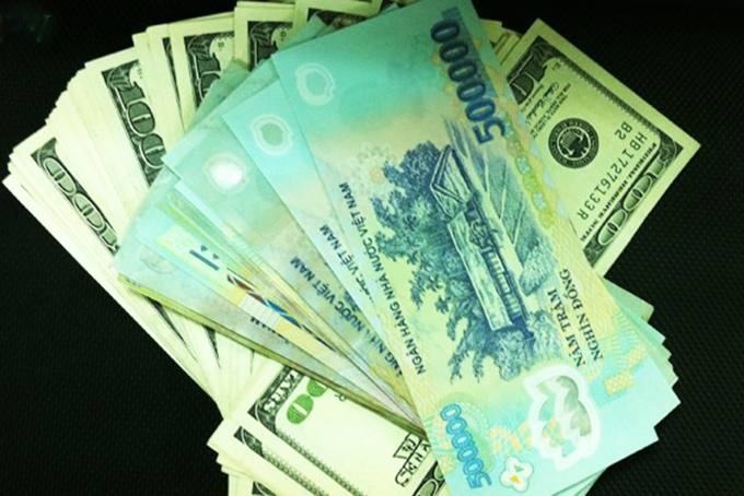 Giá USD "giậm chân tại chỗ" phiên đầu tuần 6/1