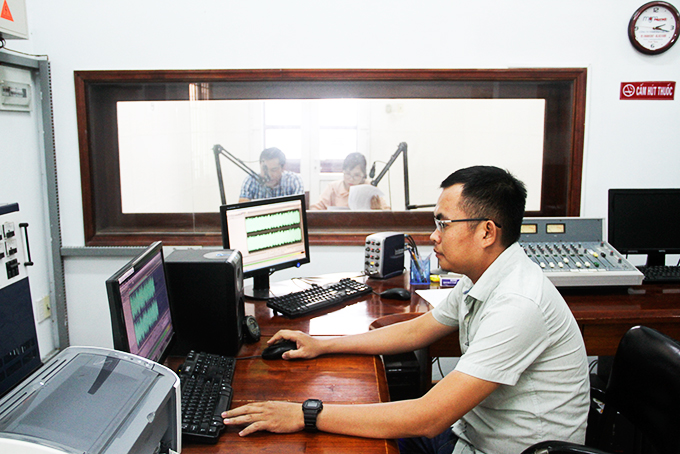Nha Trang Radio staff preparing for a broadcast
