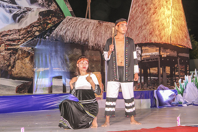 Performance of traditional costumes of Raglai ethnic minority at an art show