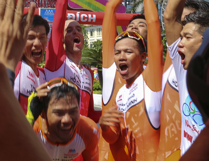 Ho Chi Minh City cyclists celebrating victory