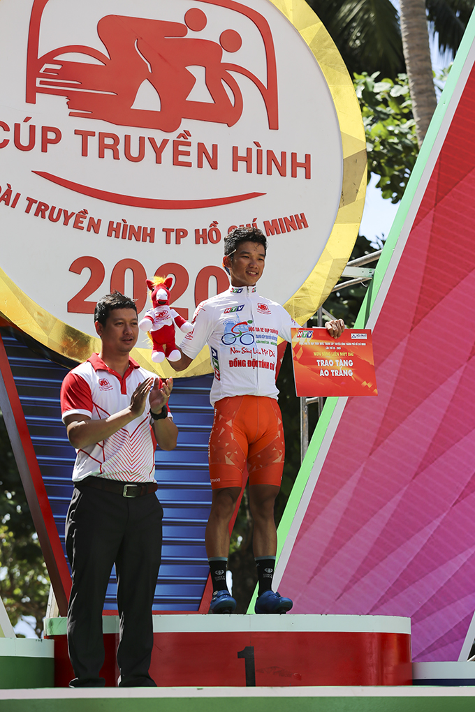 Cyclist Nguyen Van Binh of Ho Chi Minh City team still retains white jersey