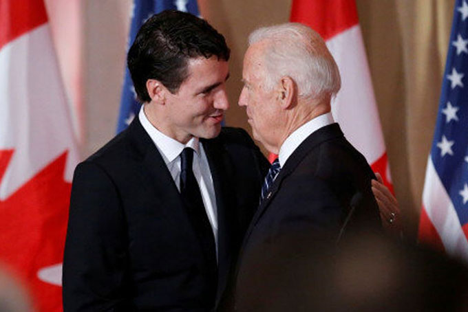 Ông Justin Trudeau (trái) và ông Joe Biden. Ảnh: Reuters.