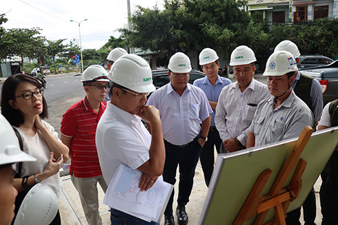 Delegation inspecting wastewater pumping station