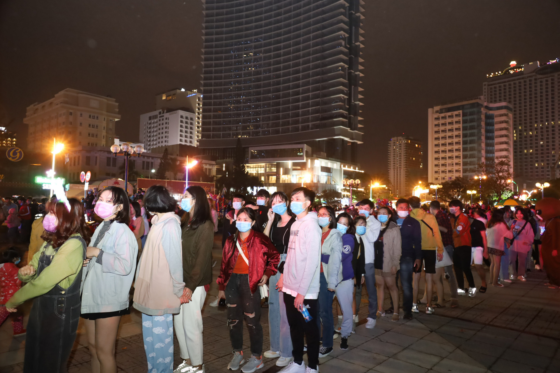 Queue of people waiting to get into music show area