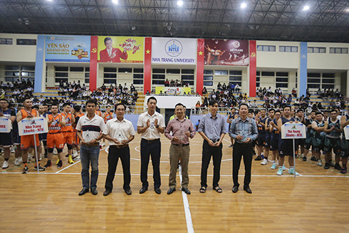 Organization board presenting commemorative plaques to Nha Trang University and sponsors…