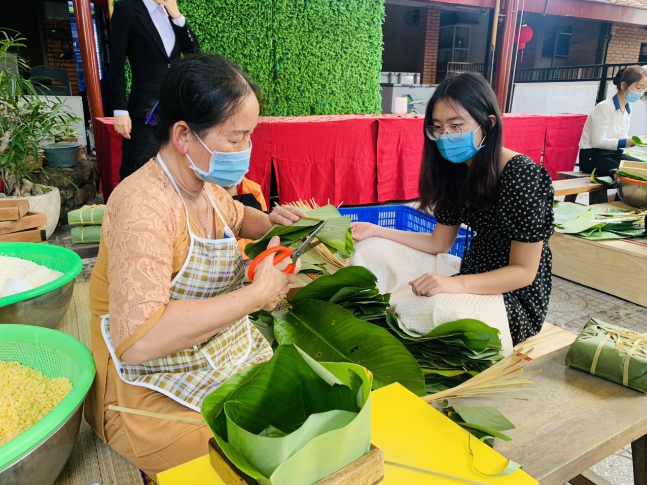 The hotel prepares ingredients to make Banh Chung including glutinous rice, mung beans, pork, and dong leaves