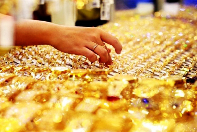 Giá vàng mất mốc 56 triệu đồng/lượng