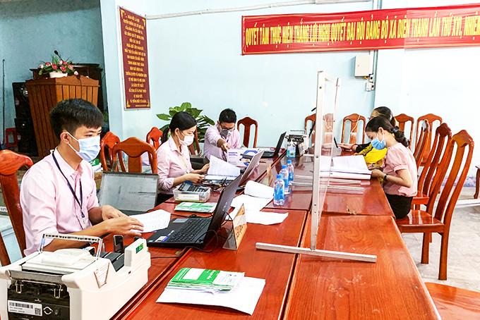 Giải ngân tín dụng chính sách tại xã Diên Thạnh (huyện Diên Khánh). (Ảnh tư liệu)