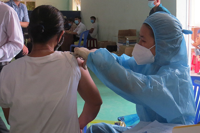 Getting vaccinated in Cam Lam.