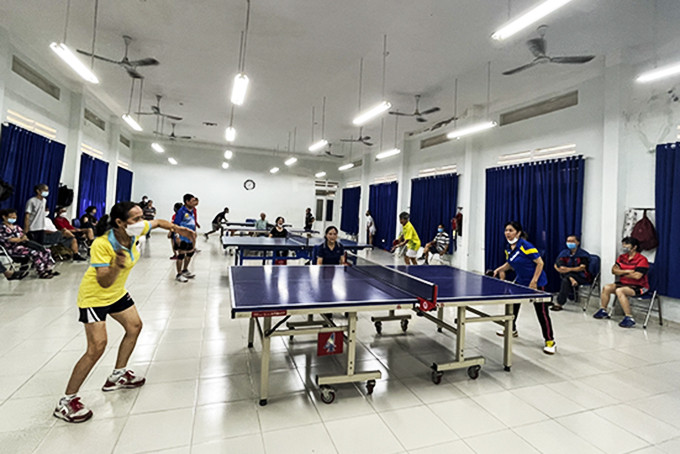 Players playing table tennis