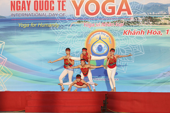 Yoga practitioners performing yoga poses