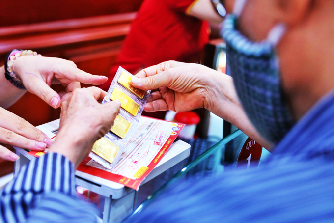 Đồng USD mạnh kéo giá vàng lao dốc