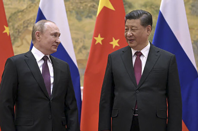 Tổng thống Nga Vladimir Putin và Chủ tịch Trung Quốc Tập Cận Bình. Ảnh: AP