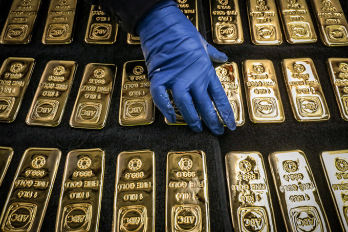 Giá vàng thế giới tăng vượt ngưỡng 1.800 USD/ ounce. (Ảnh minh họa - Ảnh: Bloomberg)
